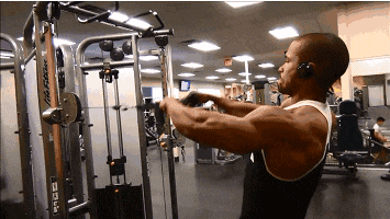 双腿自然站立身体保持前倾保持背部打直,使用肩部力量将哑铃平举,保持