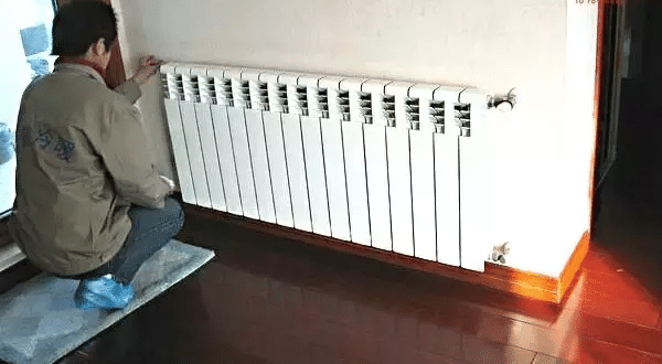 之前的热源为燃煤锅炉,进出水温度为95/70℃时,所需铸铁四柱760暖气片