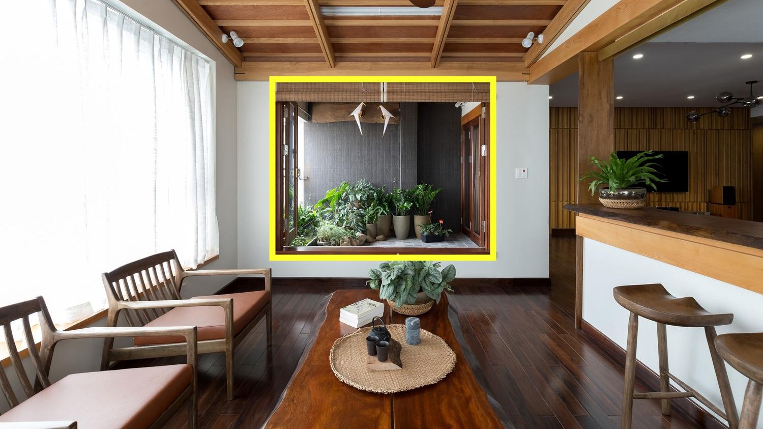 这就是理想的布局，一半客厅一半室内阳台，住在高层也有庭院用了