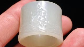 和田玉籽料|清乾隆 和田玉籽料 白玉 仙人乘搓 诗文 扳指 把件