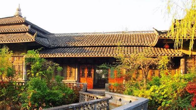 园林|上海“最奇葩”的园林，古桥都是从别处移来，但风景优美游客也少
