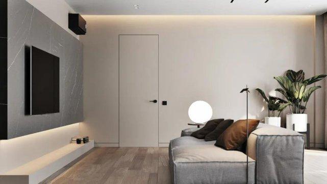 136平简约风三居室，看起来极度舒适的沙发，位于客厅的中心