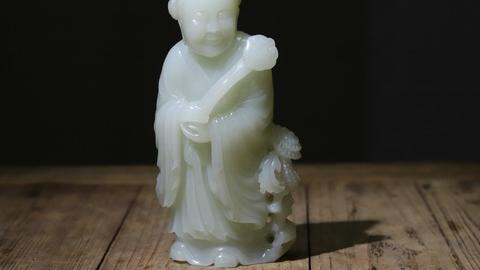 文玩|舊藏和田玉“洒金皮 童子执如意”