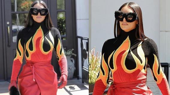 金·卡戴珊|金卡戴珊夸张打扮，把大腿绑成肉粽！高调“炫腹”，风格又变了