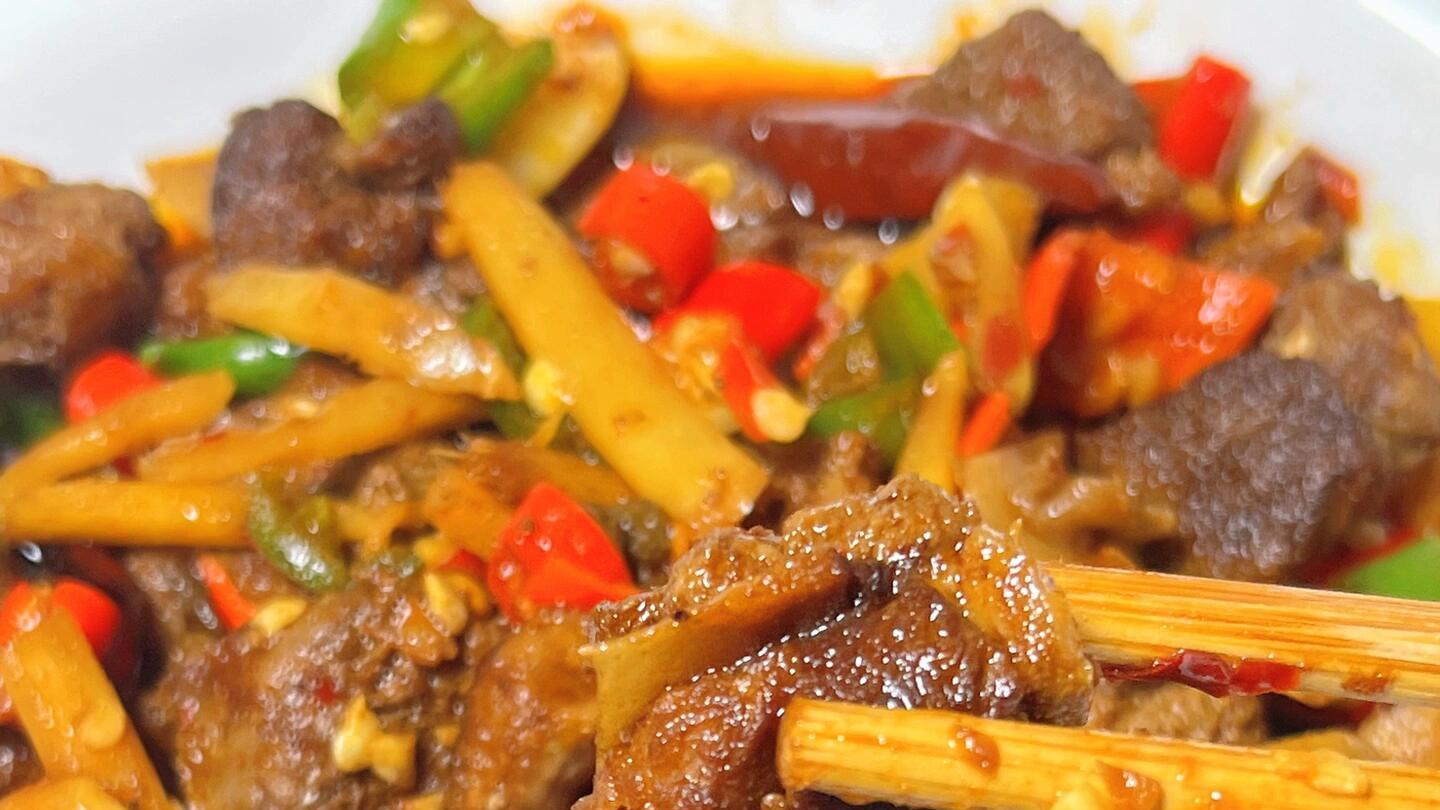 “仔姜炒鸭”