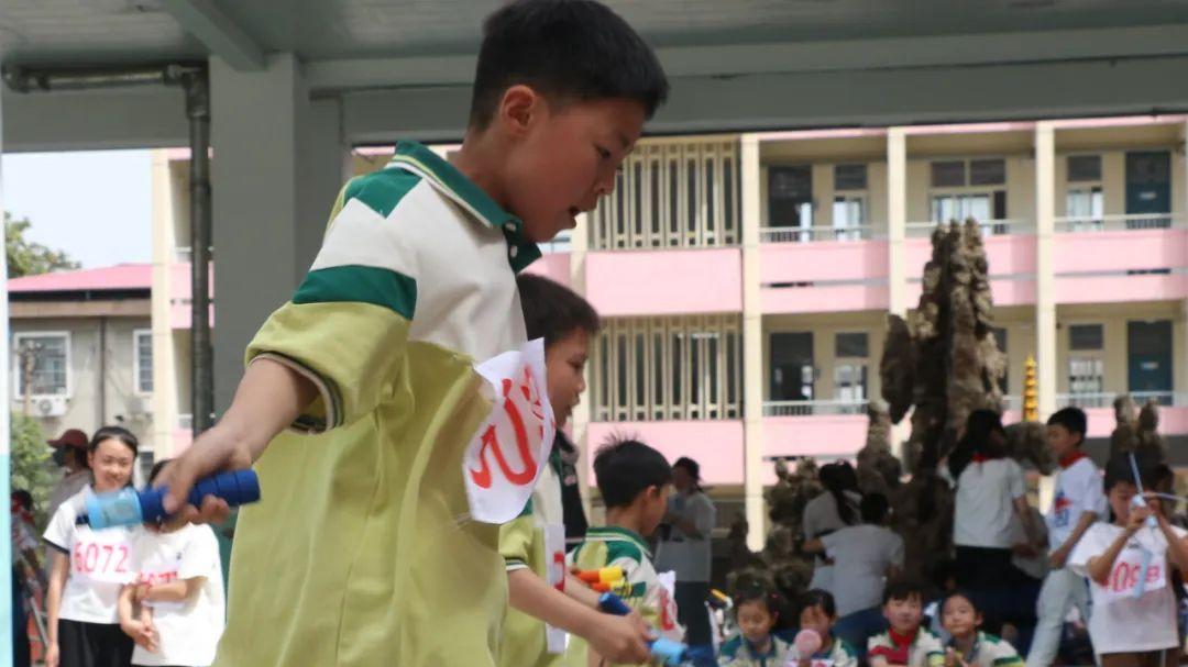 信阳市羊山新区第五小学“燃动春日跃向未来”春季田径运动会