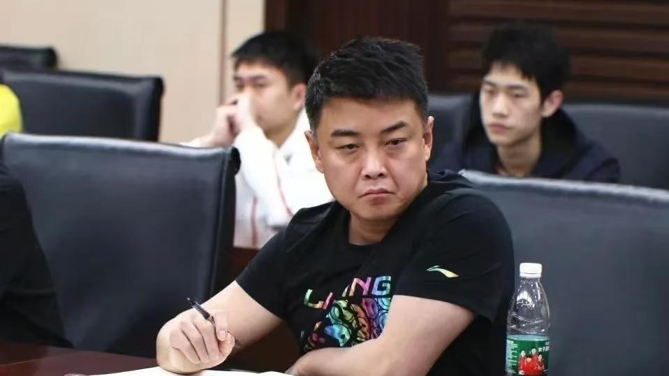 男乒在多哈世乒赛上男单夺冠，王励勤就坐稳了，否则男乒会改组吗