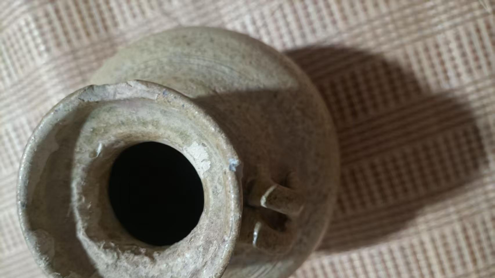 青釉双系盘口壶：千年瓷韵里的古陶瓷工艺与生活记忆