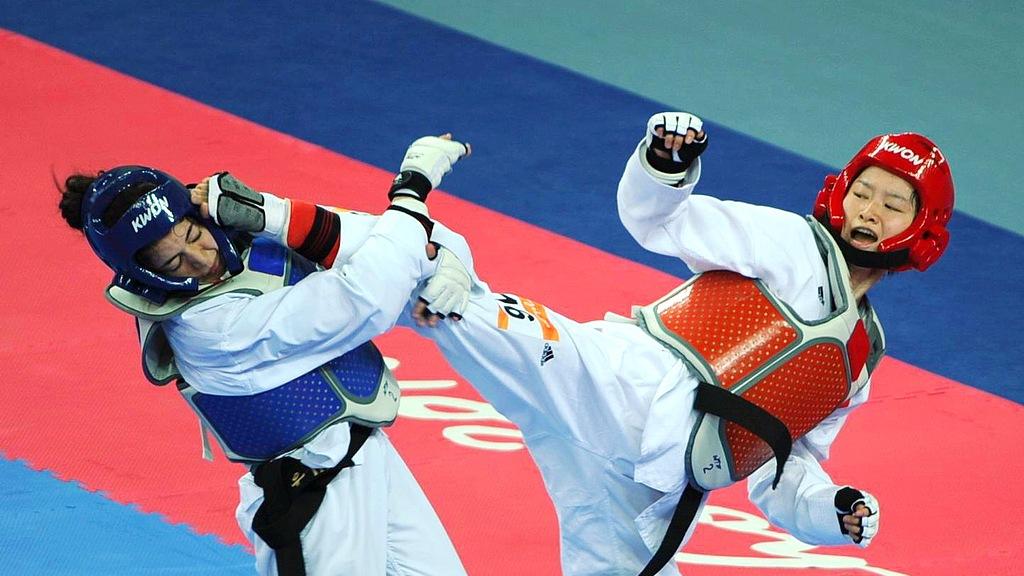 吴静钰两夺奥运金牌，跆拳道界的巾帼英雄成长之路