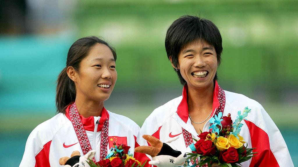2004 年雅典奥运会李婷/孙甜甜女双夺冠的热血时刻