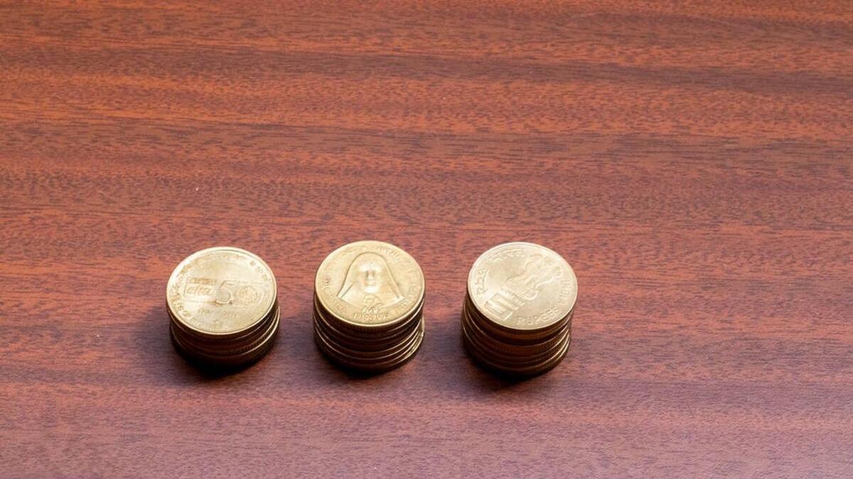 菊花 1 角硬币：岁月的遗珠，你是否还拥有？