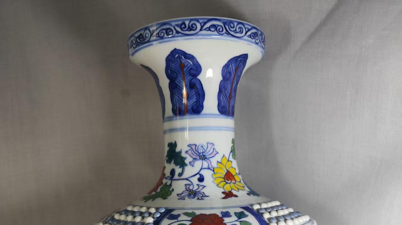 珠玑斗彩韵，繁花盛世情 —— 雍正官窑珠形花卉瓶赏鉴