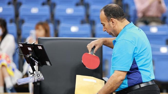 多哈世乒赛球拍风波追踪：光头裁判操作失误或为事件主因