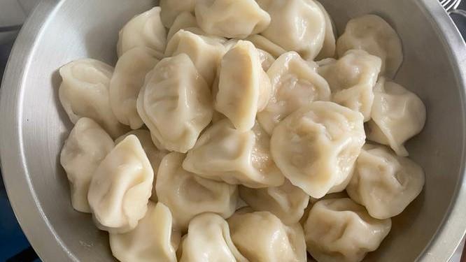 饺子：四十年硝烟酿的团圆馅，战壕褶皱裹着不灭的番号