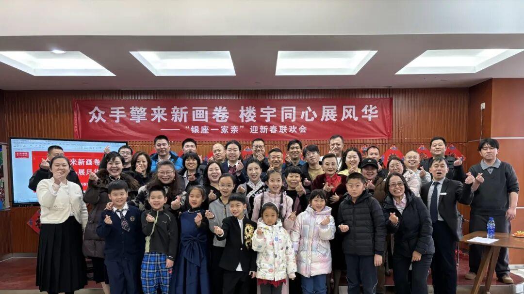 众手擎来新画卷 楼宇同心展风华