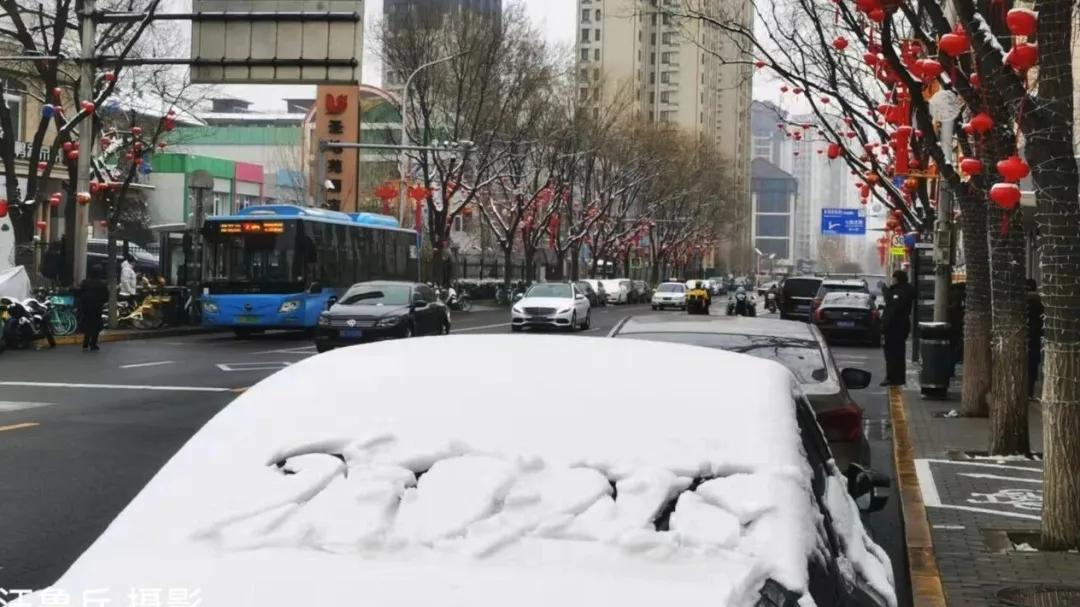 惊蛰日雪映京城：自然诗意与人心光亮交融