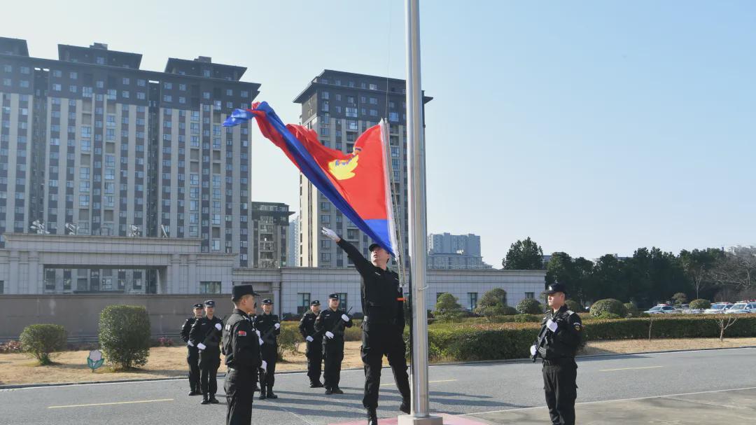 息县公安局举行第六个中国人民警察节升警旗仪式
