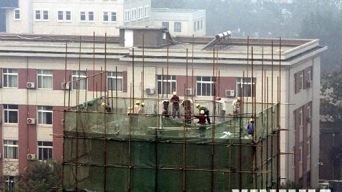 北京近现代建筑遗产为何想留留不住？