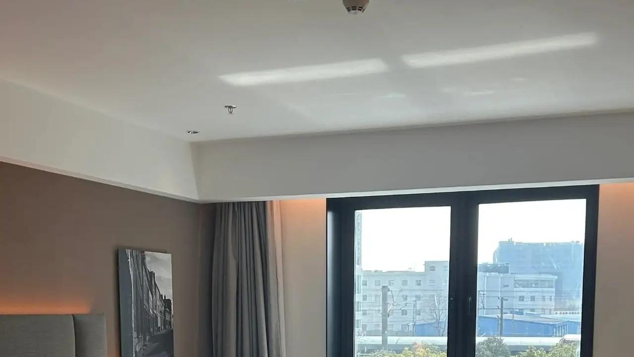 酒店回访电话掀家庭破碎风波：错不在电话，而在人心