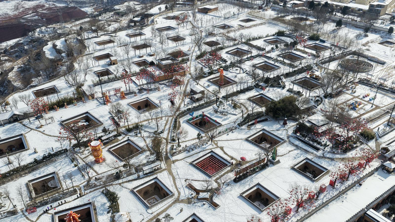 雪映地坑院 乡韵唤归程