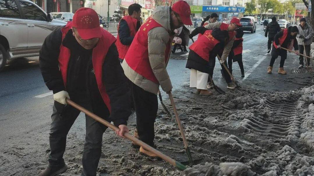 信阳市教体局：风雪砺初心 担当暖寒冬