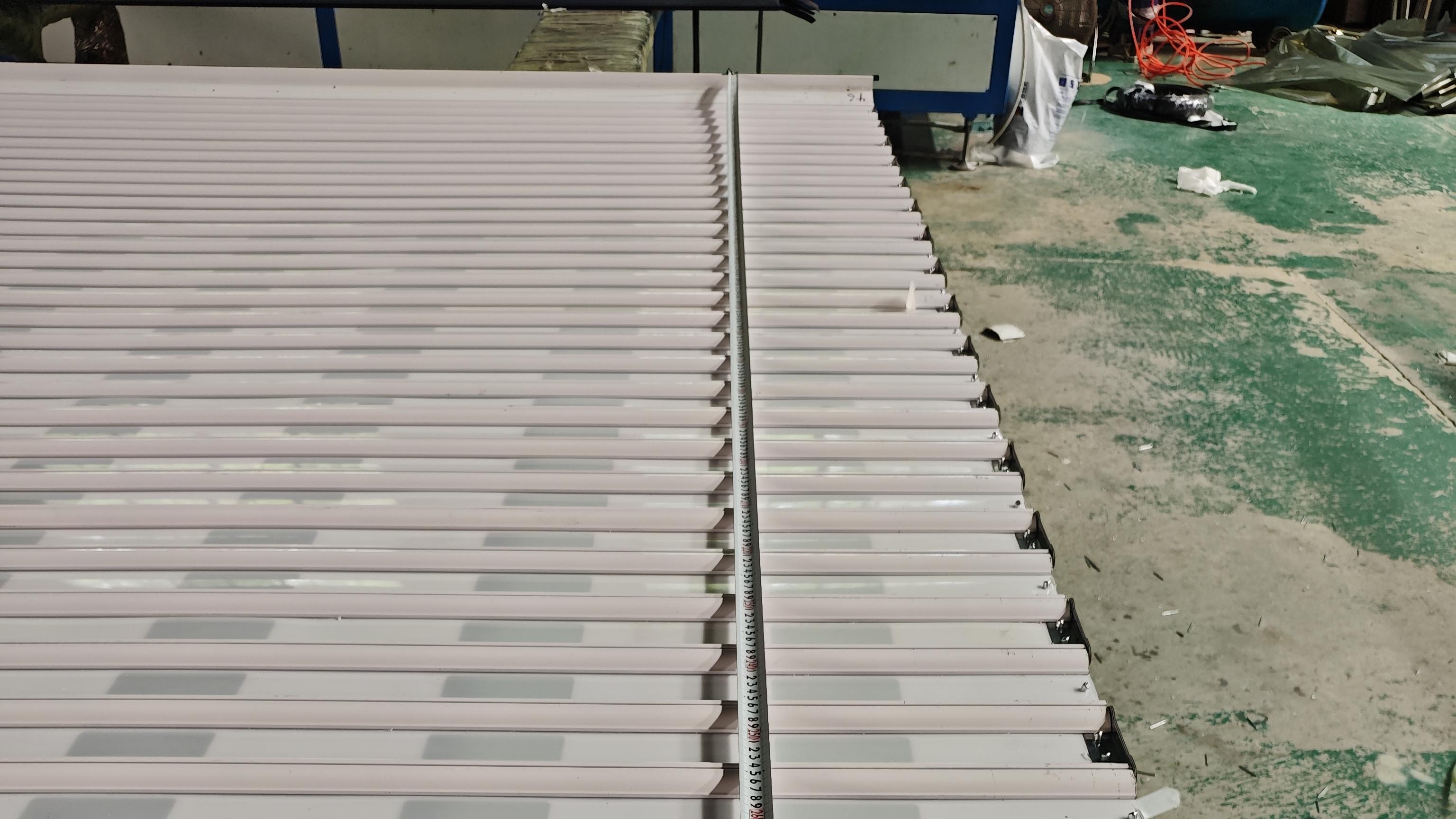 哪些厂家能定制电动卷帘门帘片厚度？