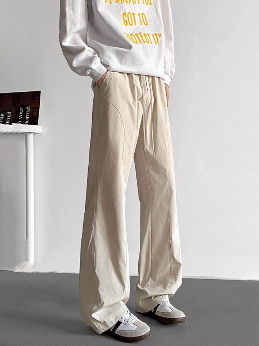 米白色斜切软壳冲锋裤男春秋冰丝速干弯刀裤