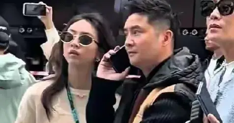 46岁田亮携全家亮相F1赛场，变黑发福认不出，森碟下巴后缩未改善