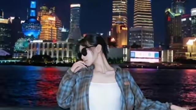 屋檐下小憩的静者：刷到国民党发言人江怡臻