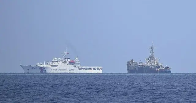 中非三条战线激烈交锋，美军航母开进南海压阵，怂恿菲军变本加厉
