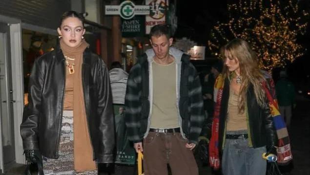 超模吉吉和贝拉·哈迪德一身时髦的冬日装扮，展示修长性感的身材