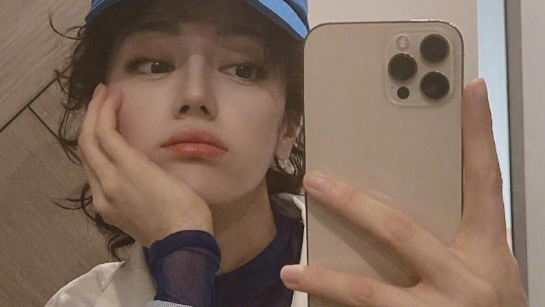 迪丽热巴|迪丽热巴晒照引争议，滤镜太高被讽刺“网红脸”，其实已经够美了