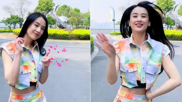 黄圣依|39岁黄圣依当街热舞！外套不系扣露出内搭，腰肢纤细腹肌隐约可见