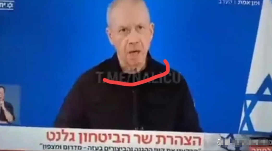 离个大谱，他为什么要戴面具？图中是以色列国防部长约阿夫·加兰特，可诡异的是他居然