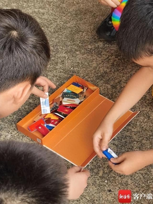 废弃烟盒变身“烟卡”游戏，小学生新游戏隐藏健康风险