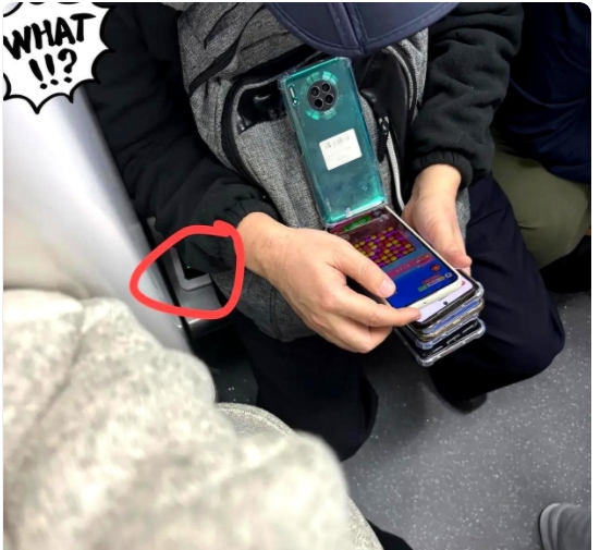 今天搭地铁，碰到一件惊奇的事儿！我对面坐着一人，手里竟拿着七八台手机，各品牌俱全