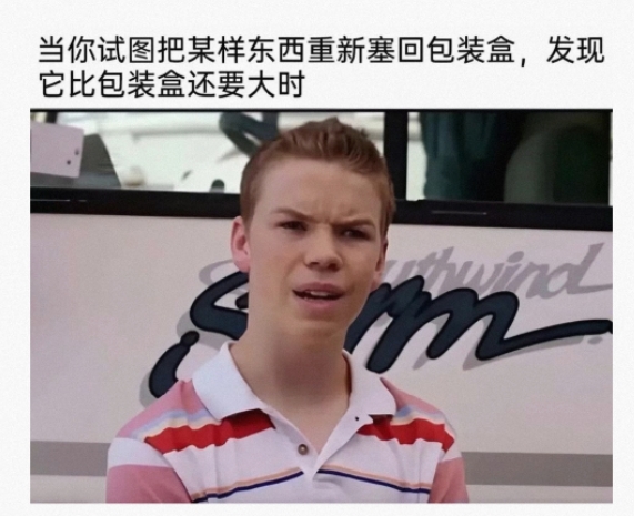 试图把某样东西重新塞回包装盒