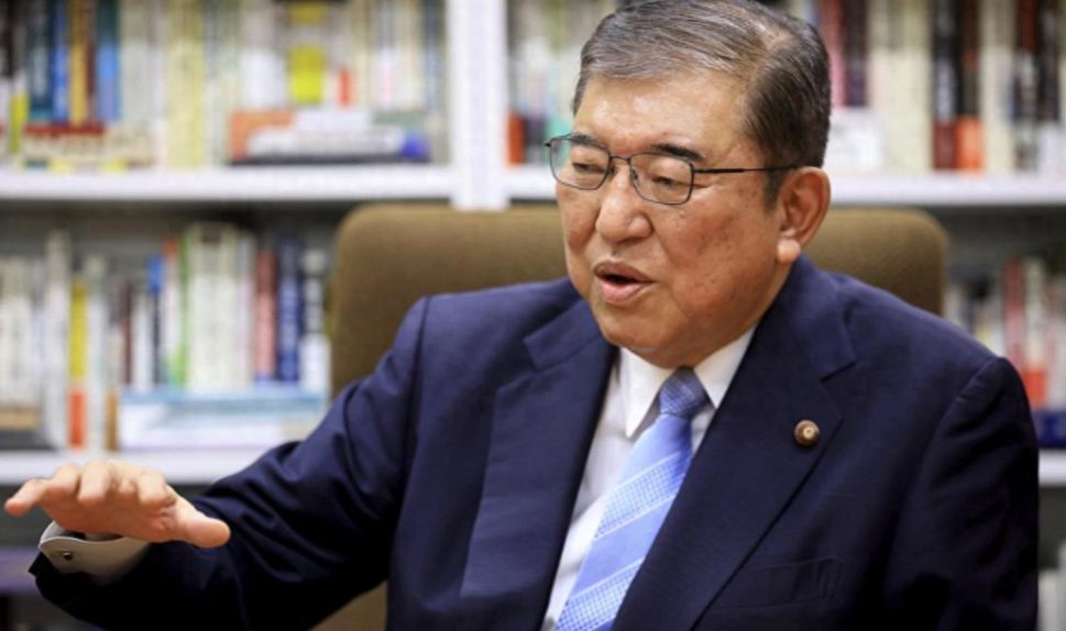 对华释放善意惹怒美国？日本新首相刚示好，拜登就冻结百亿收购案