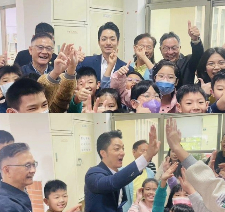 台北市长蒋万安今天赶赴台北市长安国小参加学术研讨会时，恰好与刚下课的大批小学生在