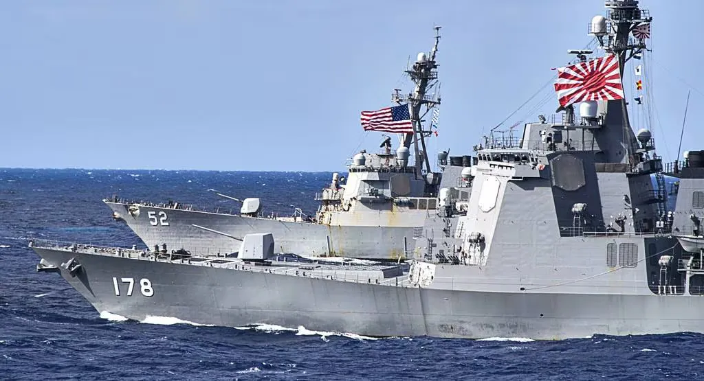 日本船只靠近，意图很明显，就是美国授意的，日本不得不执行。这种行为并不新颖，与美