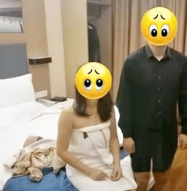 山东一男子，发现妻子与情夫在楼下酒店幽会，当他强行闯入后，看见妻子穿着情趣内衣和