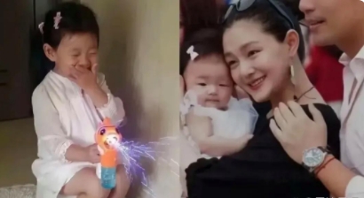 这个捂嘴笑的小女孩
等到她长大成人
她的小姨小S会告诉她
她的妈妈徐熙媛
究竟是