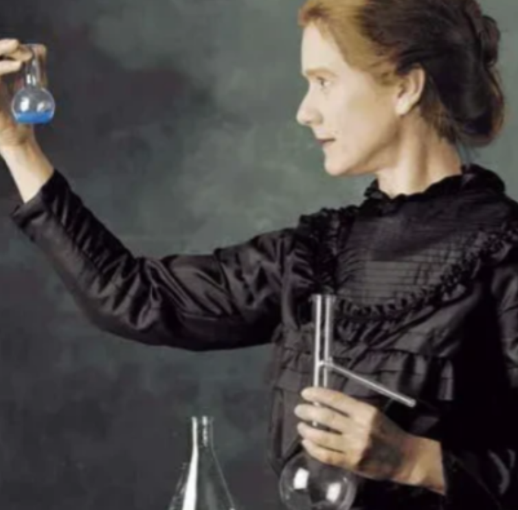 1910年，44岁的居里夫人起床去上课，学生朗之万一把搂住她纤细的腰肢，表示不想