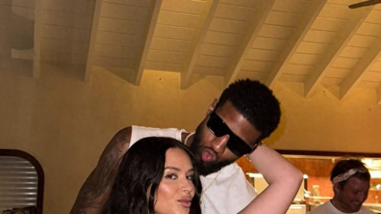 乔治和娇妻度假，拿2.1亿合同后摆烂，场均仅16分，娇妻很美丽