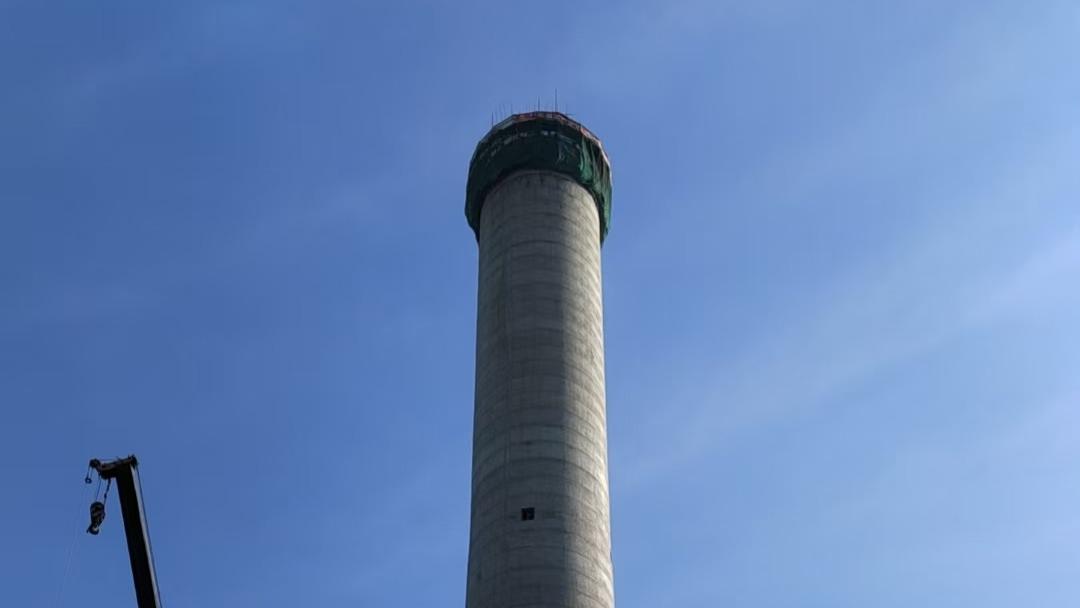 钢骨擎绿绘锡城 新烟囱焕彩—宏顺建设无锡能达130米烟囱新建