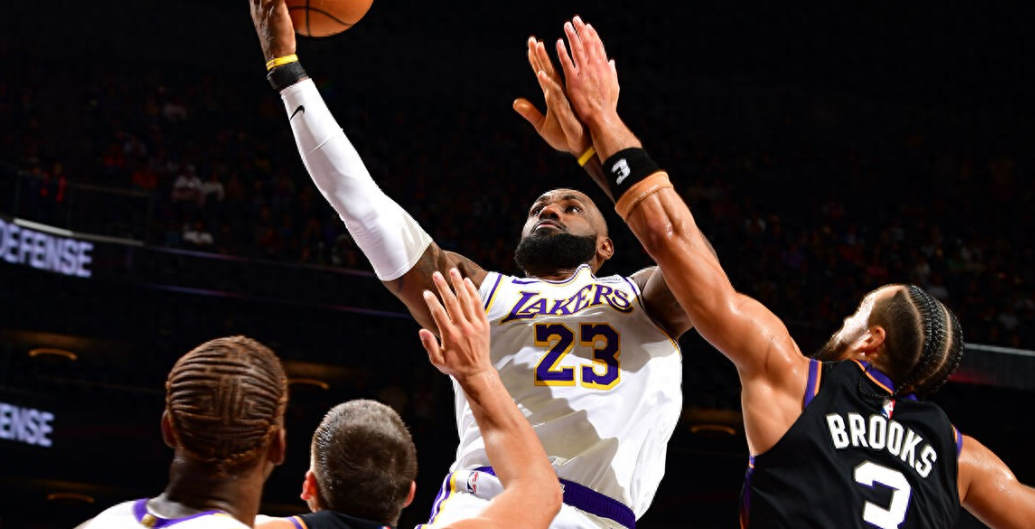 洛杉矶湖人在客场以116-114险胜菲尼克斯太阳，狄龙关键时刻轰进反超三分，但随