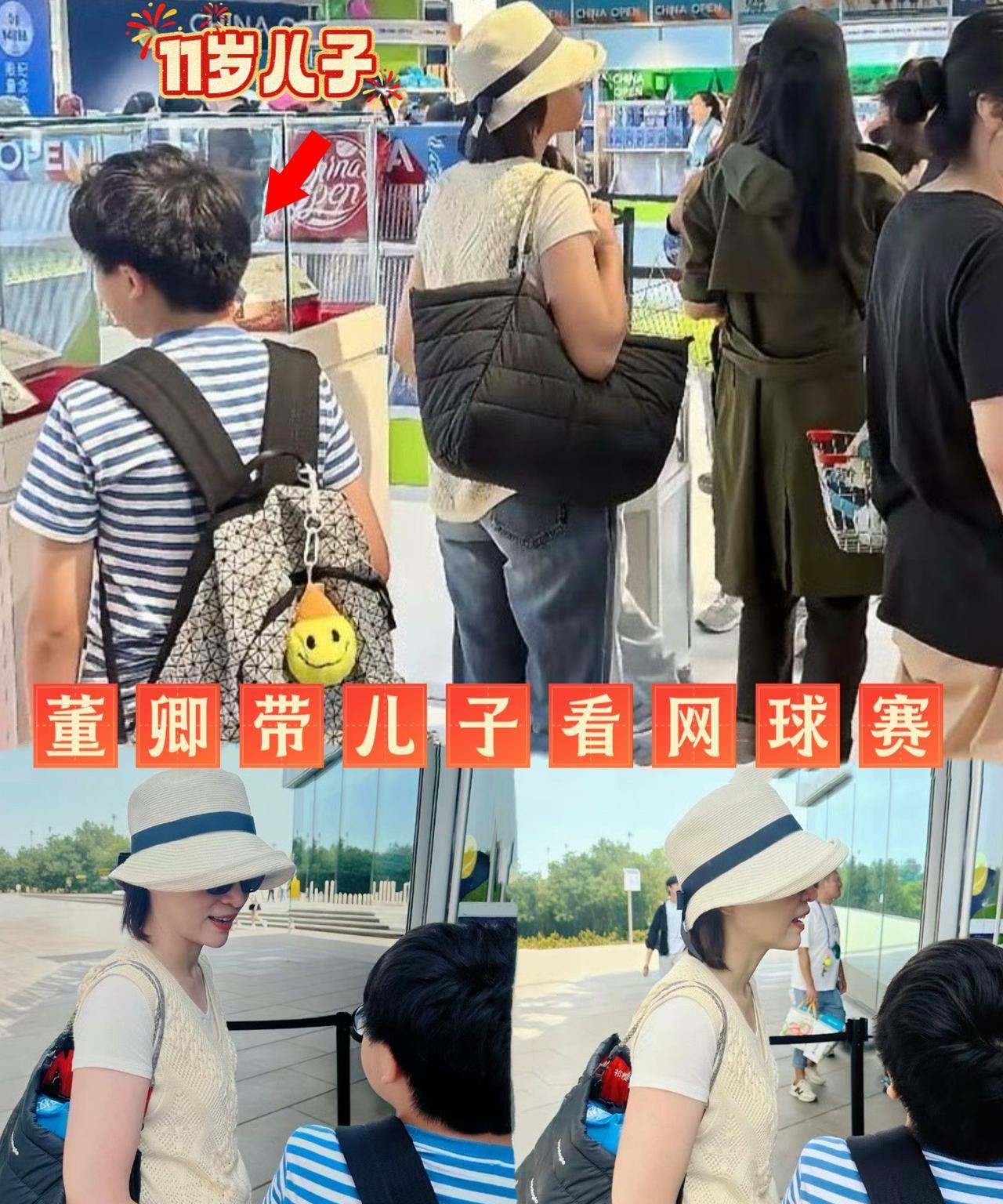 董卿带儿子看球赛，小王子11岁，个头已经超过妈妈肩膀了，戴着眼镜，看起来很壮实，