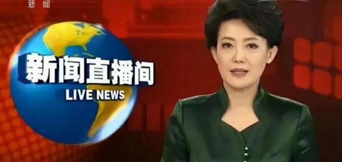 [送自己一朵花]墨香里的独舞
      《新闻联播30分》开播前两小时，梁艳总