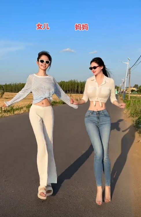 38岁单亲妈带高考结束的女儿直播热舞，露脐装引百万围观，评论区炸锅！



六月