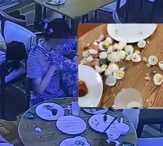 “不是傻就是坏？”一女子在西安住酒店，因自助餐不让外带，她捏碎20多个鸡蛋。一个